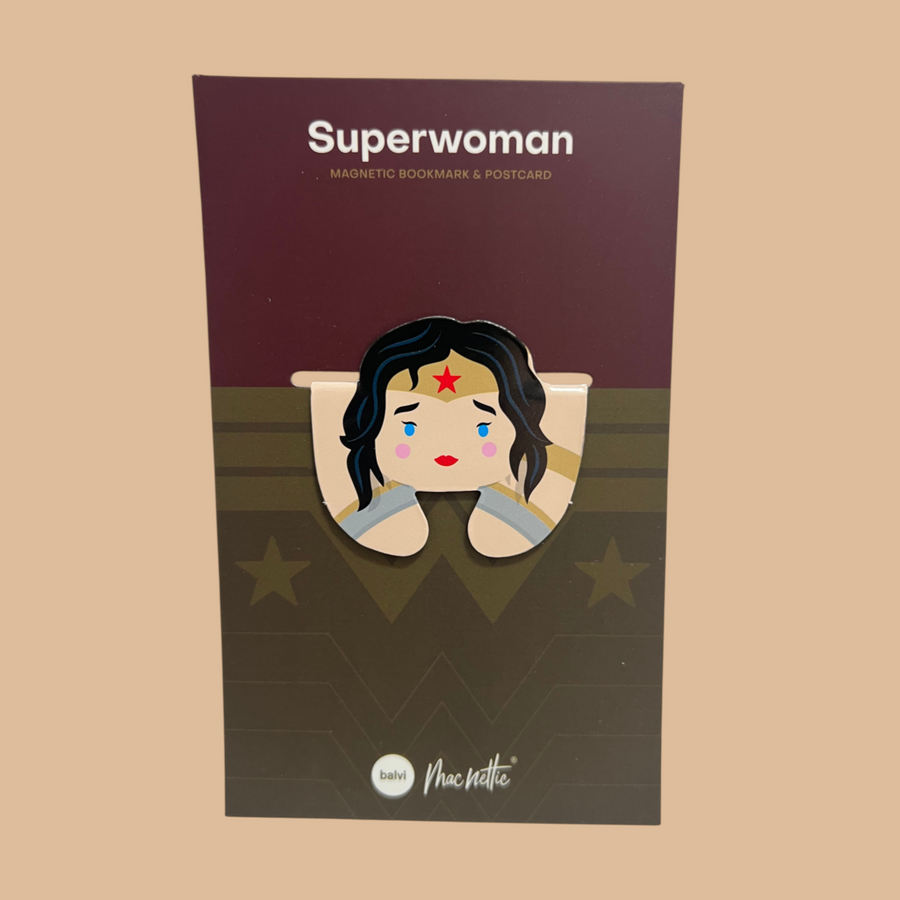 Marque-page magnétique Superwoman représentant une super-héroïne sur un livre